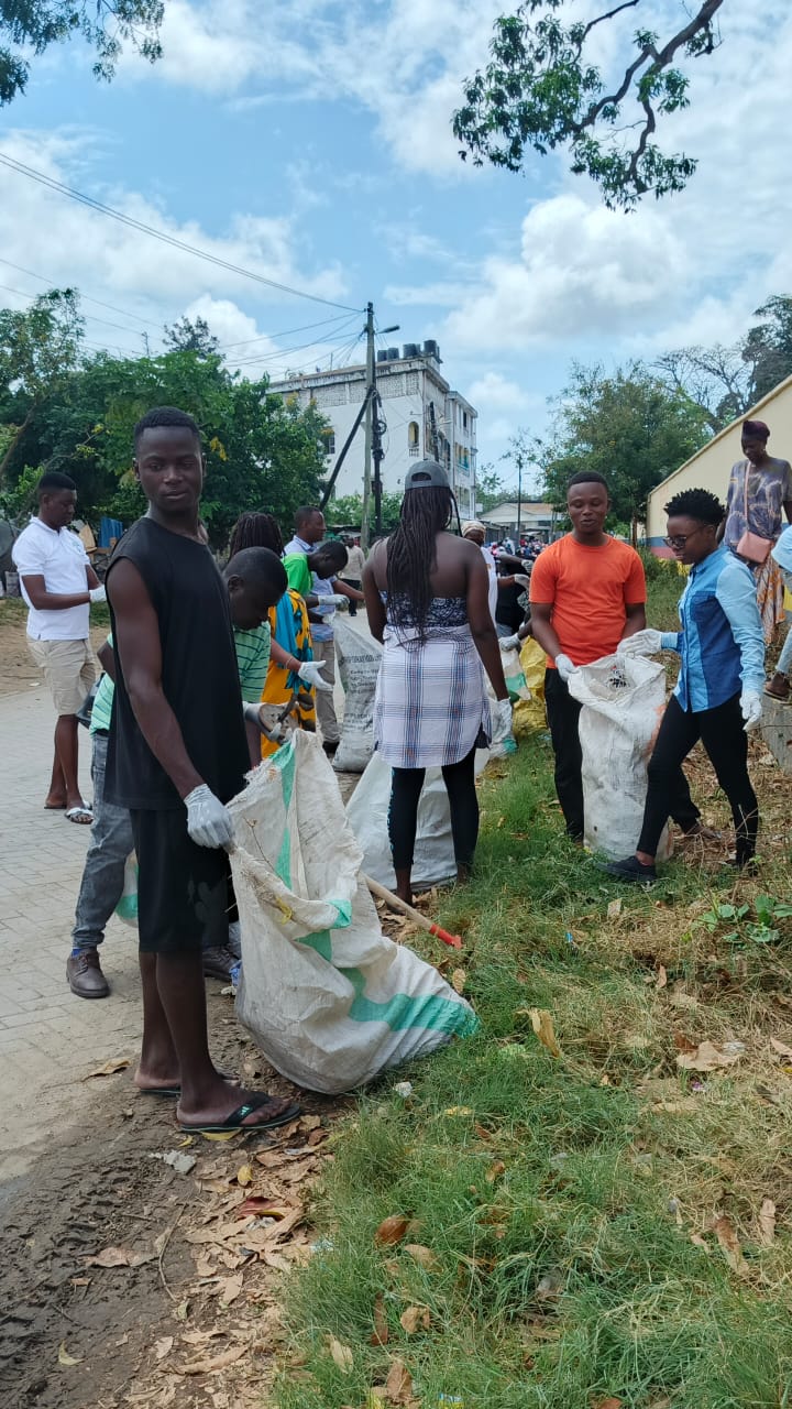 Community members collecting litter